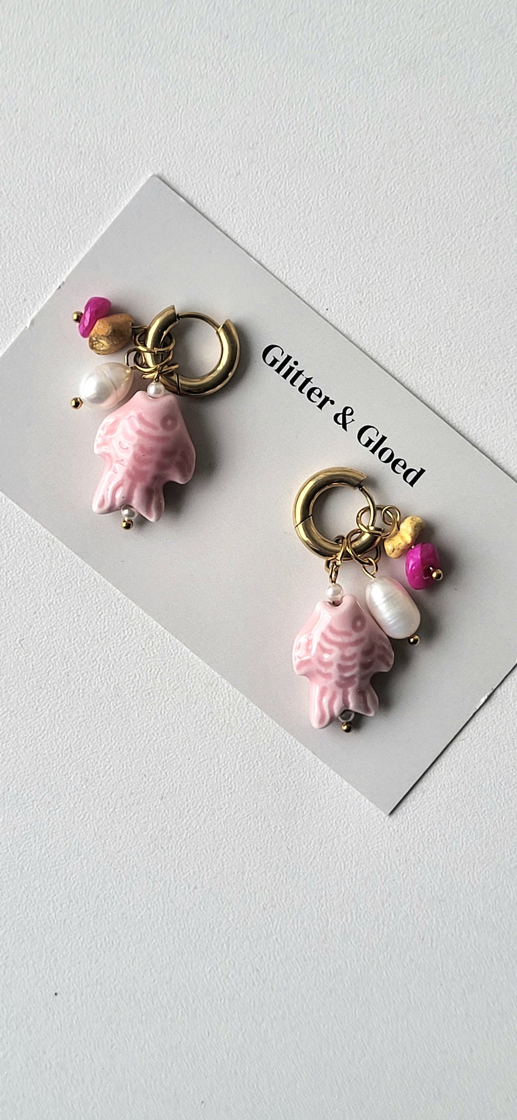 Fish & pearl oorbellen